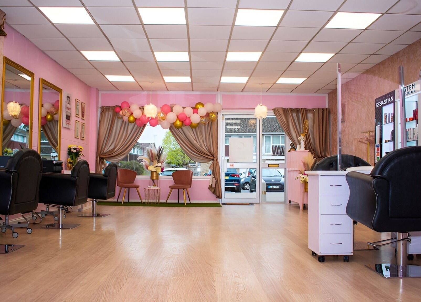 Elegant salon interior at Naturally U, Sittingbourne, England, GB, featuring chic decor and stylish seating.