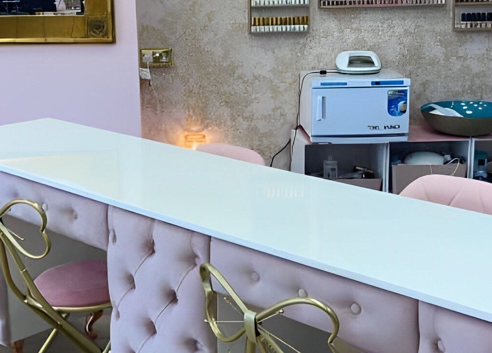 Elegant reception area at Naturally U, Sittingbourne, England, GB with plush chairs and modern decor.