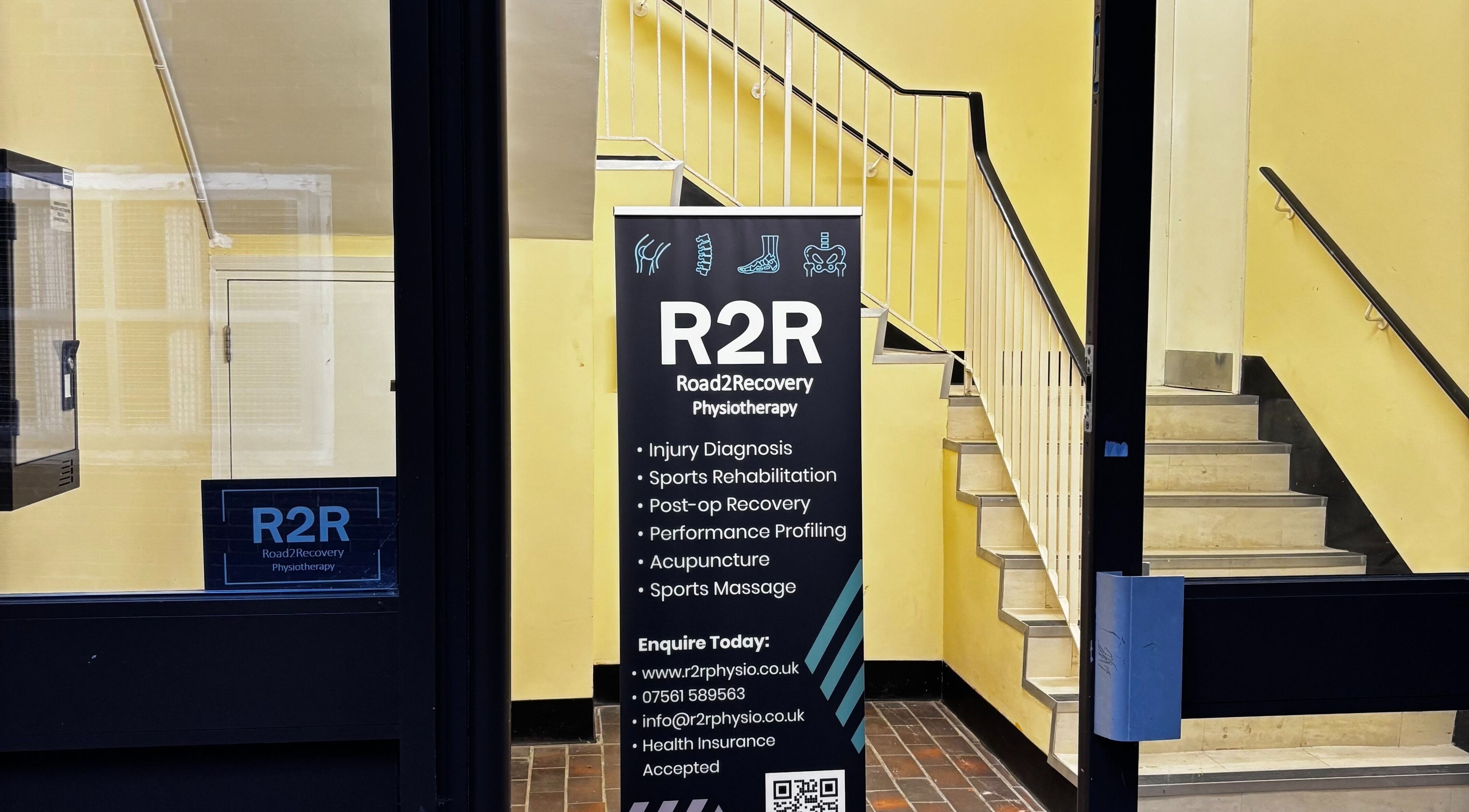 Entrance of R2R Physiotherapy Braintree showing a promotional display in Braintree, England, GB.