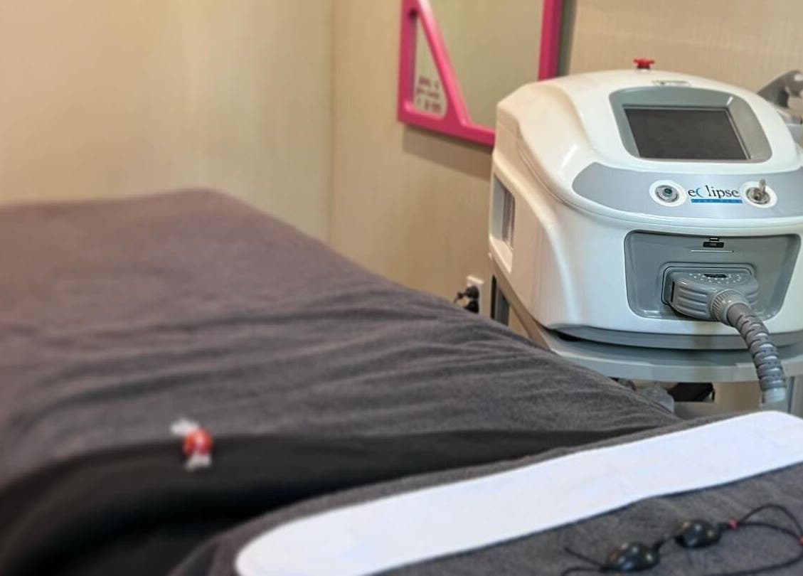 State-of-the-art treatment room at Studio M, Horsham Downs, Waikato, NZ, showcasing advanced wellness equipment.