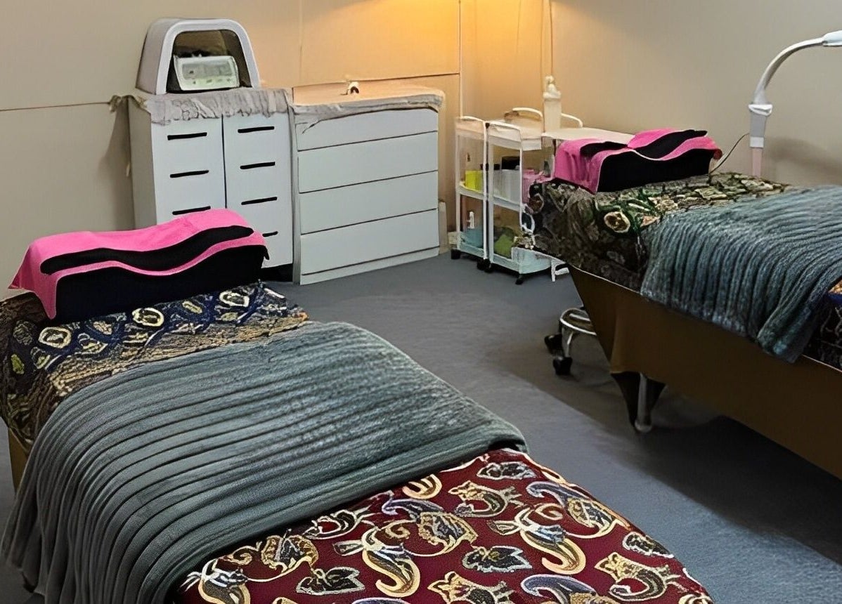 Cozy treatment beds at De Elvina Medispa in Muar, Johor, MY offer a calming wellness experience.