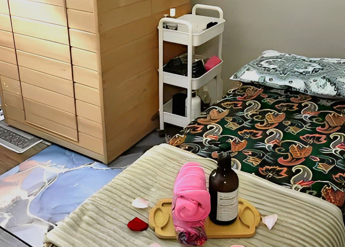 Tranquil treatment room at De Elvina Medispa, Muar, Johor, MY with cozy bed and spa essentials.