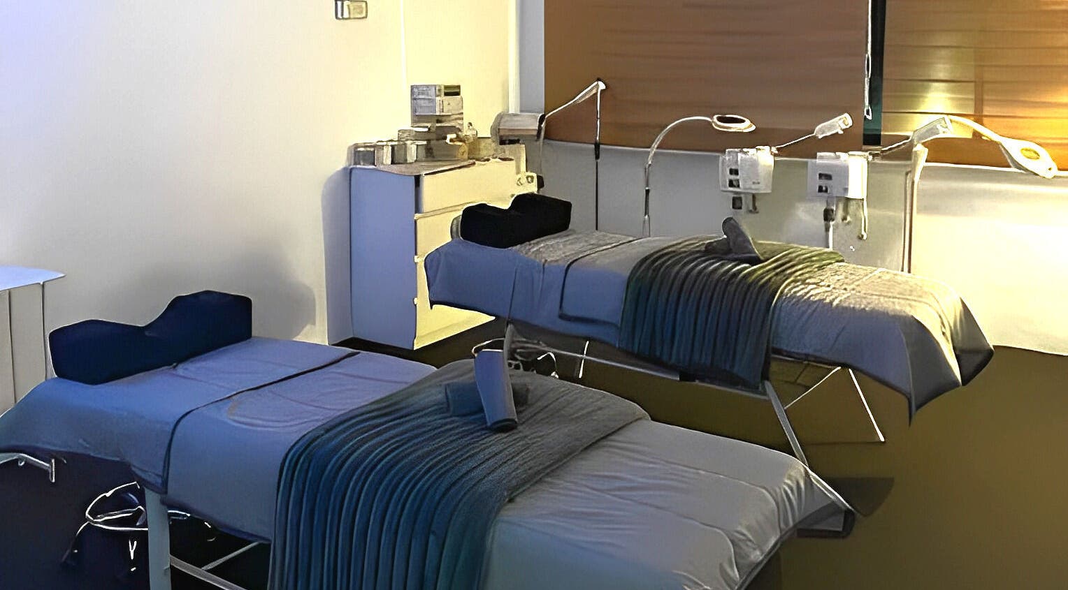 Relaxing treatment beds at De Elvina Medispa, Muar, Johor, MY showcasing a serene ambiance.