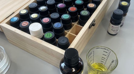 Open box of essential oils at Nataliia’s Massage, Abergavenny, Wales, GB, showcasing relaxation and wellness.
