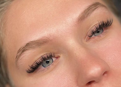 Close-up of a woman's enhanced lashes at BELLE - Lash and Brow Artistry, East London, Eastern Cape, ZA.
