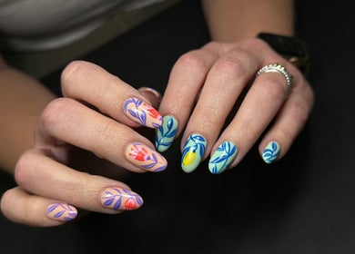 Detailed floral nail art at Nails Lab, Calgary, Alberta, CA showcases exquisite creativity and style.