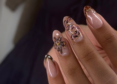 Elegant floral nail art at Nails Lab, Calgary, Alberta, CA, showcasing intricate designs and glossy finishes.