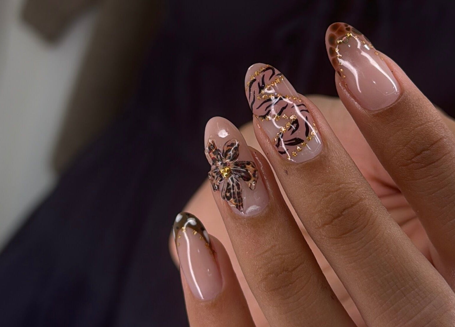 Elegant floral nail art at Nails Lab, Calgary, Alberta, CA, showcasing intricate designs and glossy finishes.