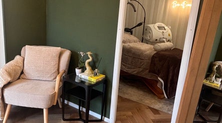 Cozy treatment room at Beam Beauty Studio, Tamworth, England, GB, featuring a plush chair and skincare equipment.