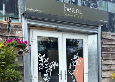 Entrance to Beam Beauty Studio in Tamworth, England, GB with floral decor and artistic door design.