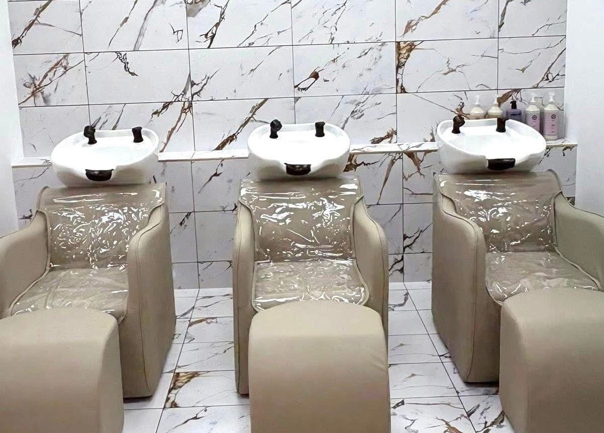 Elegant wash stations at AE HAIR, Grimsby, England, GB, offering a luxurious hair care experience.