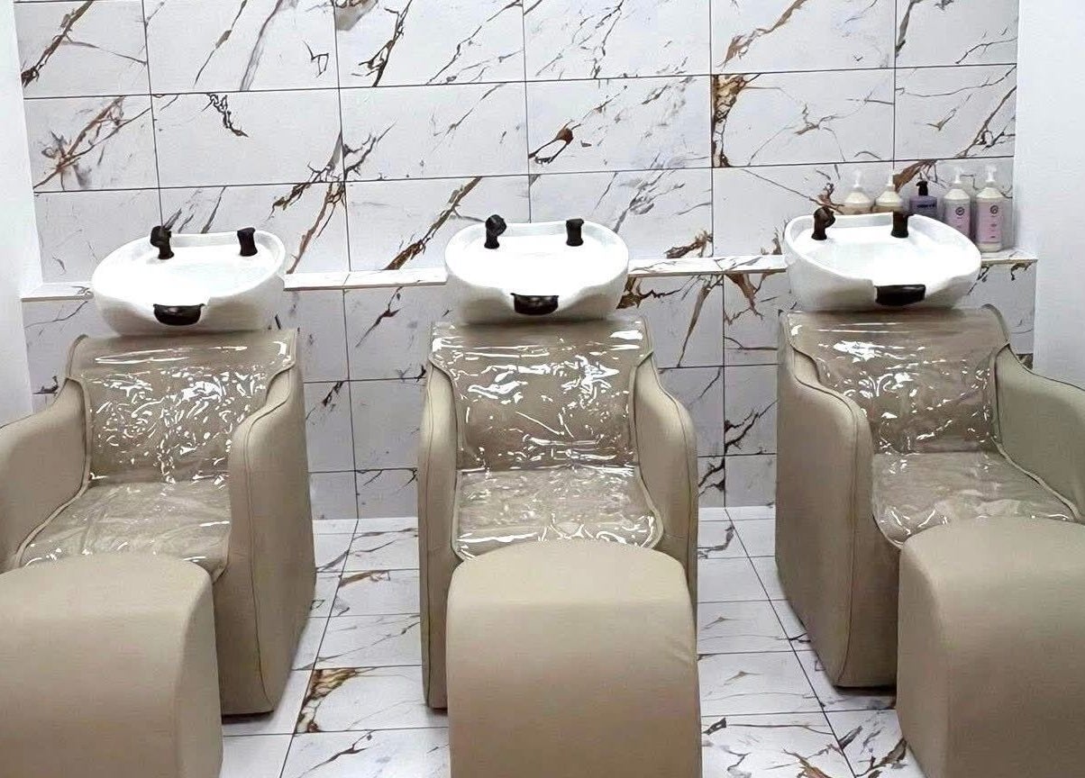 Elegant wash stations at AE HAIR, Grimsby, England, GB, offering a luxurious hair care experience.