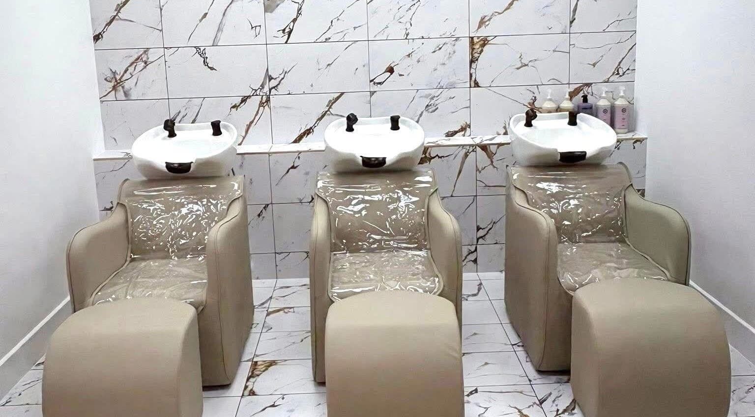 Elegant wash stations at AE HAIR, Grimsby, England, GB, offering a luxurious hair care experience.