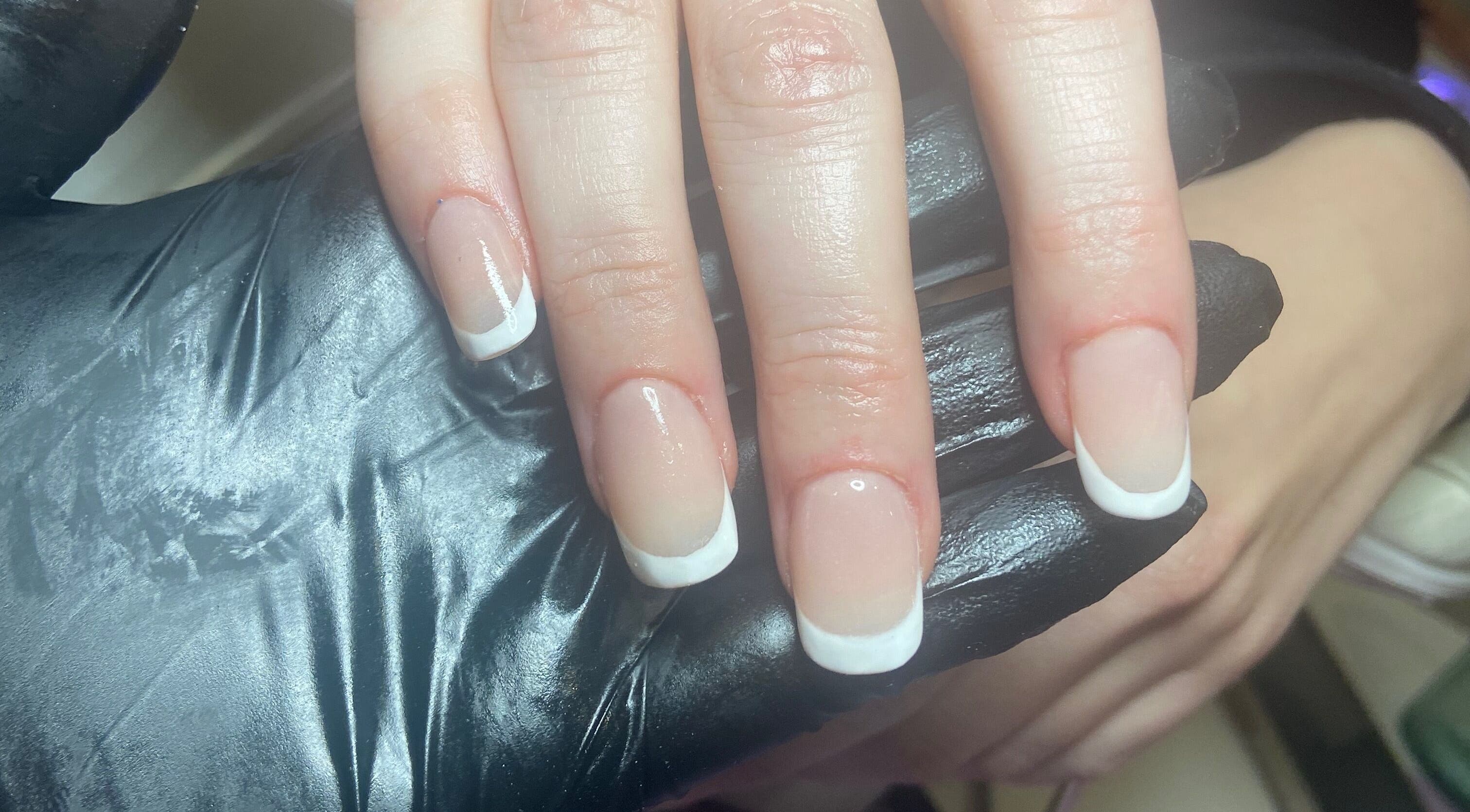 Stylish French manicure at Aqua Nails and Beauty, Bradford, England, GB.