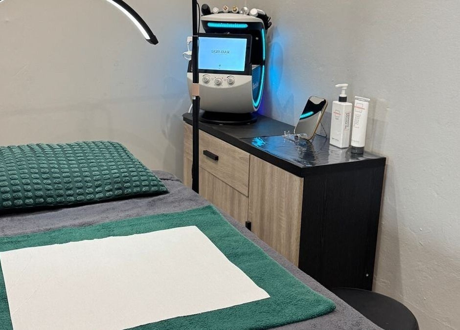 Cozy treatment room at Laser Erase - Centurion, Centurion, Gauteng, ZA with comfy bed and laser equipment.