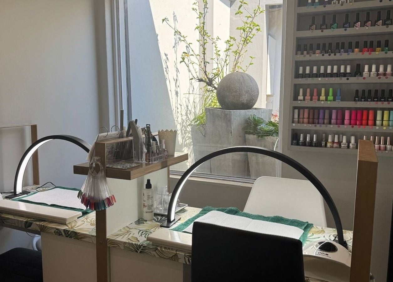 Modern nail salon at Laser Erase - Centurion with vibrant polish display; Centurion, Gauteng, ZA.