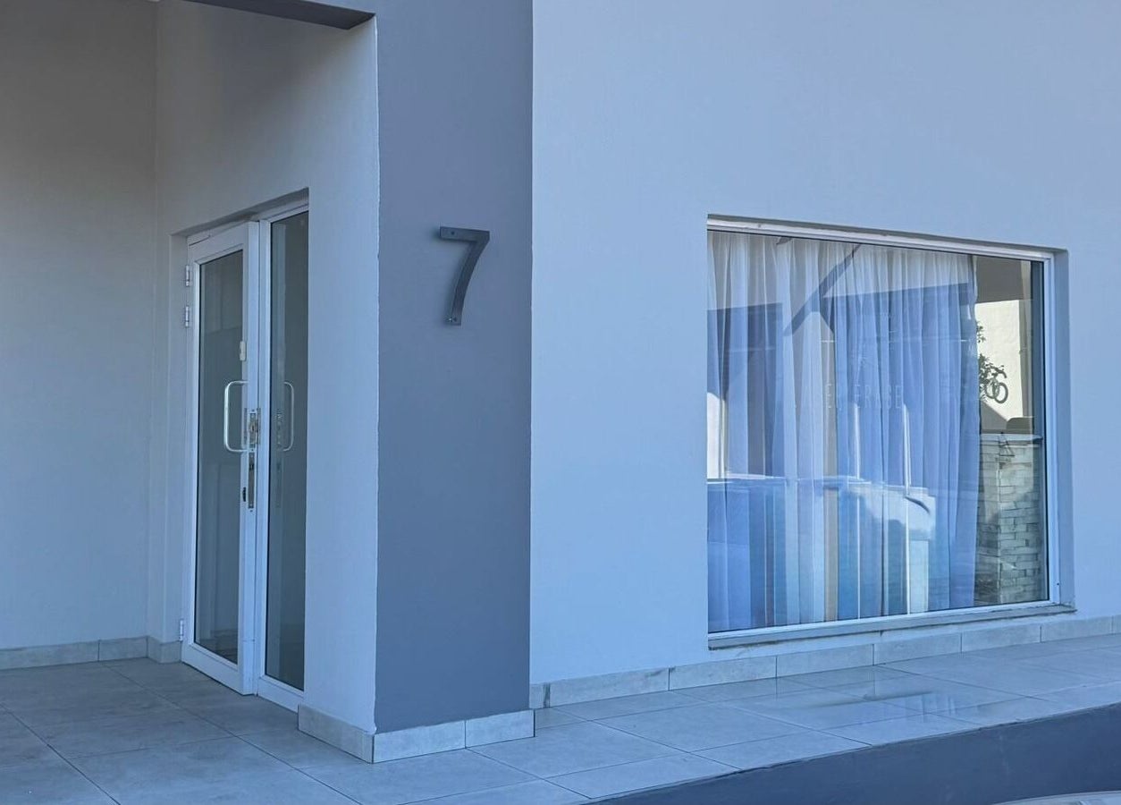 Entrance of Laser Erase - Centurion, located in Centurion, Gauteng, ZA, featuring modern architecture.