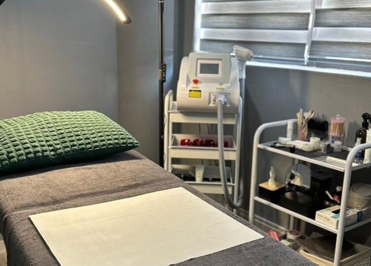 Relaxing treatment room at Laser Erase - Pretoria East, Pretoria, Gauteng, ZA, featuring equipment and supplies.