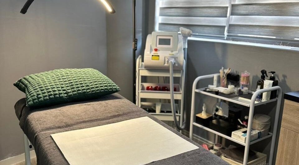 Relaxing treatment room at Laser Erase - Pretoria East, Pretoria, Gauteng, ZA, featuring equipment and supplies.
