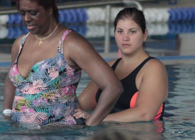 People enjoying aquatic therapy at The Pool @ Aspire, Stanmore, England, GB.