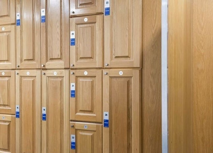 Elegant wooden lockers at Aquatic Therapeutics in The Gym, Stanmore, England, GB, offering secure storage.