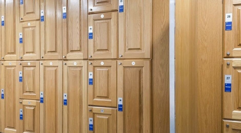 Elegant wooden lockers at Aquatic Therapeutics in The Gym, Stanmore, England, GB, offering secure storage.