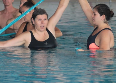 Clients enjoying aquatic exercises at Aquatic Therapeutics in The Pool, Stanmore, England, GB.