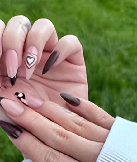 Elegant nail art with heart details from Kingdom Nails in Auckland, NZ. Perfect for stylish manicures.