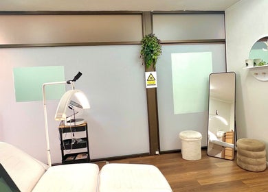 Serene treatment room at VM Cosmetic Clinic, Orange, New South Wales, AU, featuring modern decor and calming atmosphere.
