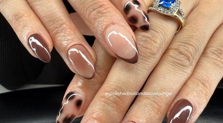Stylish brown nail art at Polished Nail and Brow Lounge in Dunedin, Florida, US showcases unique designs.