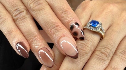 Elegant brown nail art at Polished Nail and Brow Lounge, Dunedin, Florida, US.