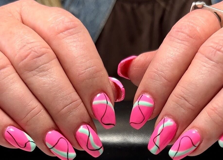 Vibrant pink and green nail art design at Polished Nail and Brow Lounge, Dunedin, Florida, US.