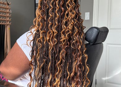 Intricate braids at D’lene Hair, Thorold, Ontario, CA enhancing natural beauty with style.