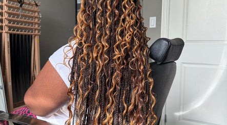Intricate braids at D’lene Hair, Thorold, Ontario, CA enhancing natural beauty with style.