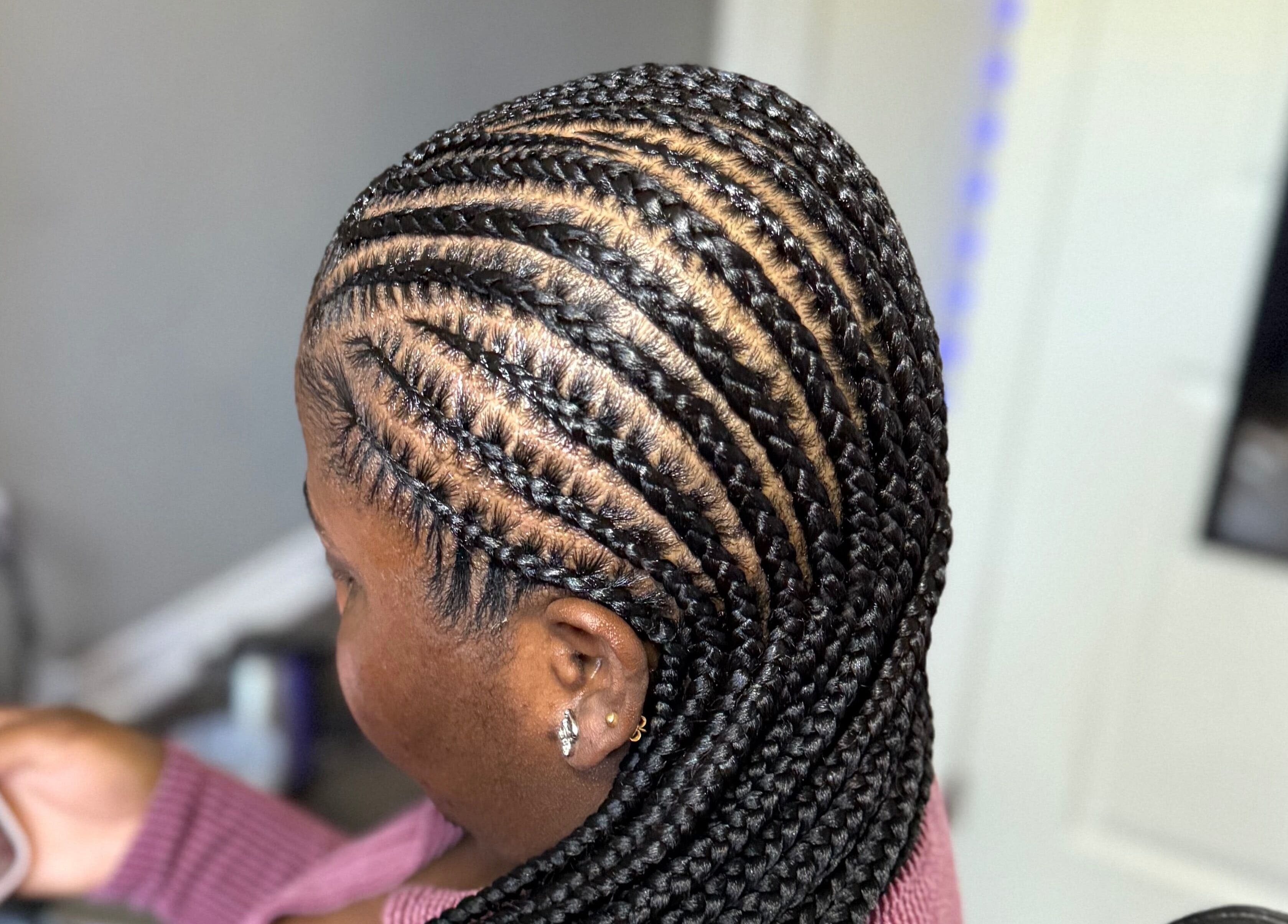 Intricate braiding style at D’lene Hair in Thorold, Ontario, CA showing expert craftsmanship.