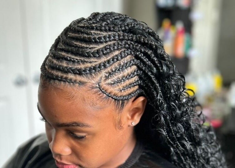 Intricate braided hairstyle at D’lene Hair in Thorold, Ontario, CA showcasing expert hair styling.
