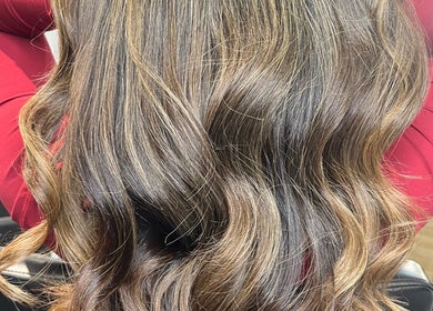 Flowing brown hair styled at Anna Francesca hair & beauty, Campbelltown, New South Wales, AU.