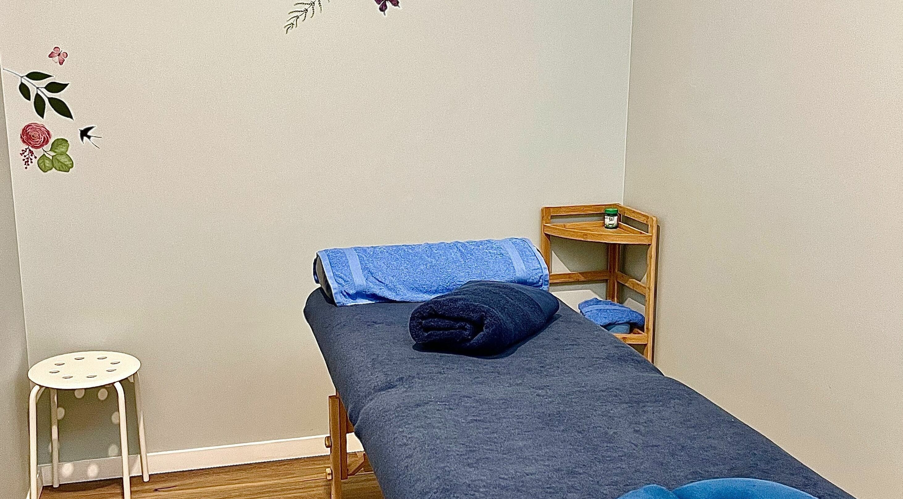 Peaceful massage room at Absolut Massage Therapy, Greenslopes, Queensland, AU with treatment bed.