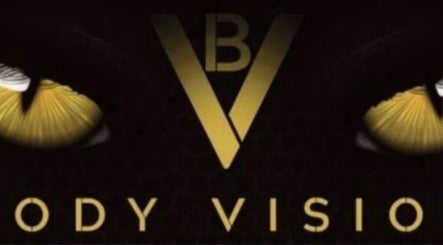 Bodyvision logo featuring bold, golden 'BV' design in Old Colwyn, Wales, GB.