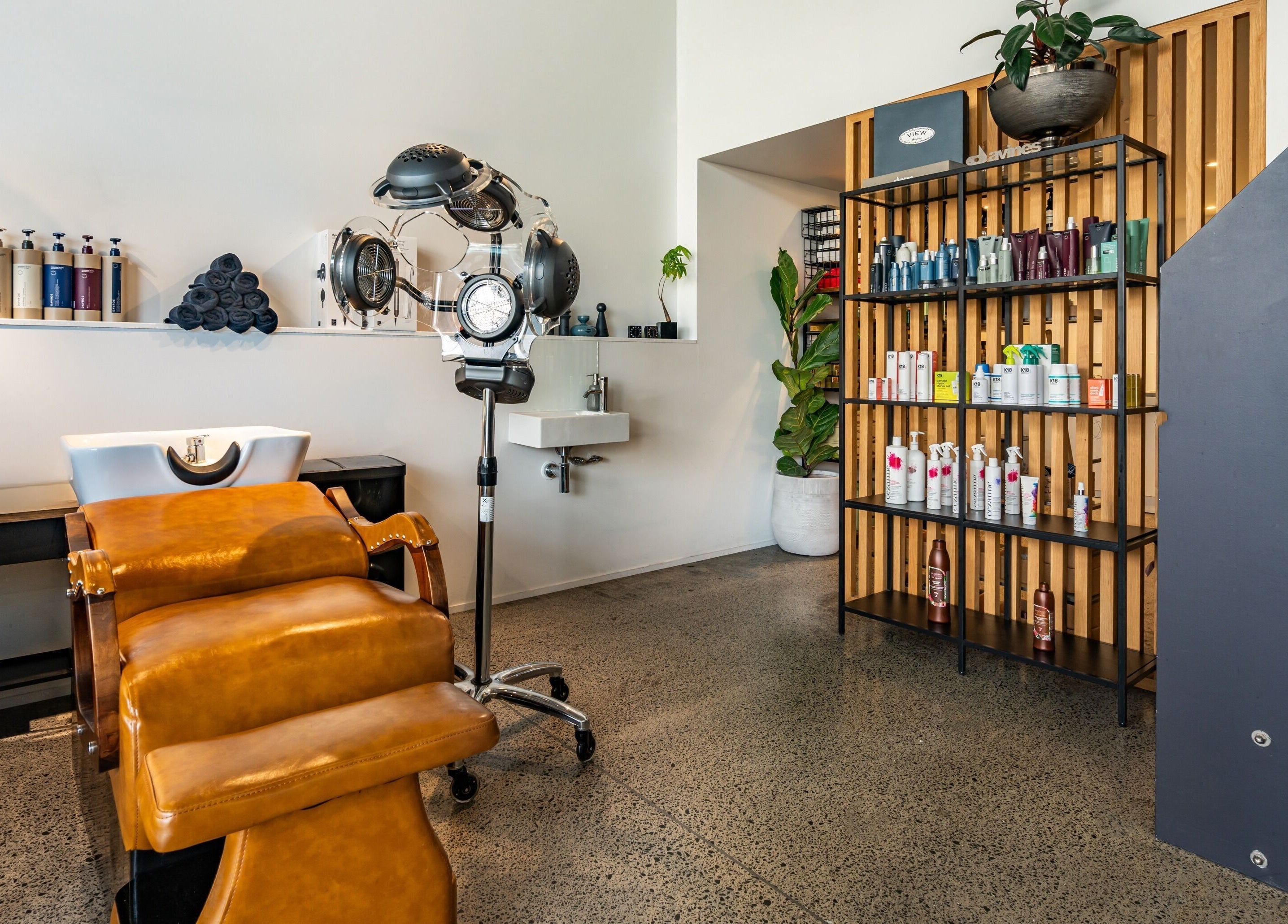 Modern hair styling chair and products at The Colour Bar, Auckland, Auckland, NZ.