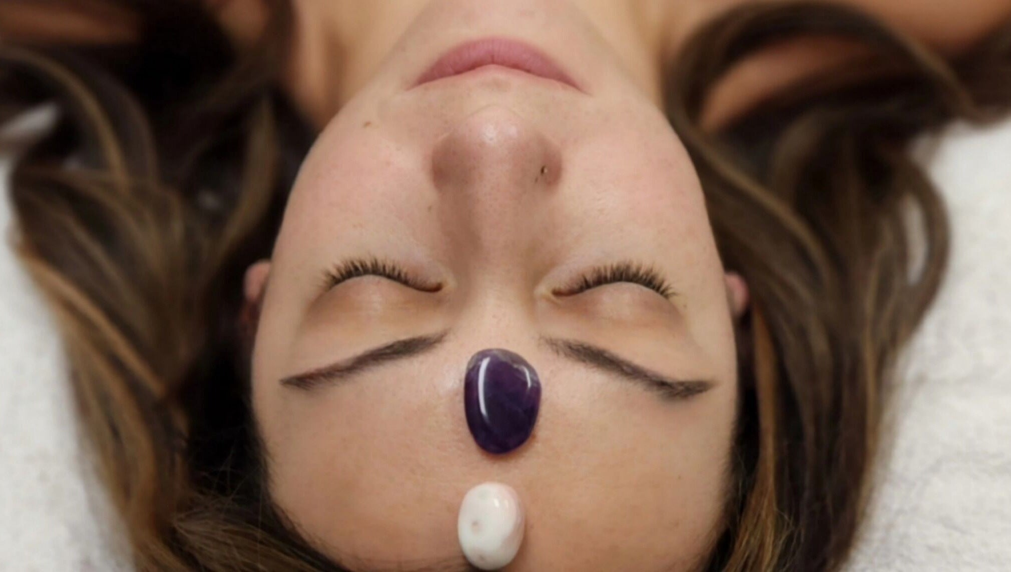 Relaxing crystal facial treatment at Enlightened Esthetics in Woodstock, Georgia, US enhances calm and wellness.