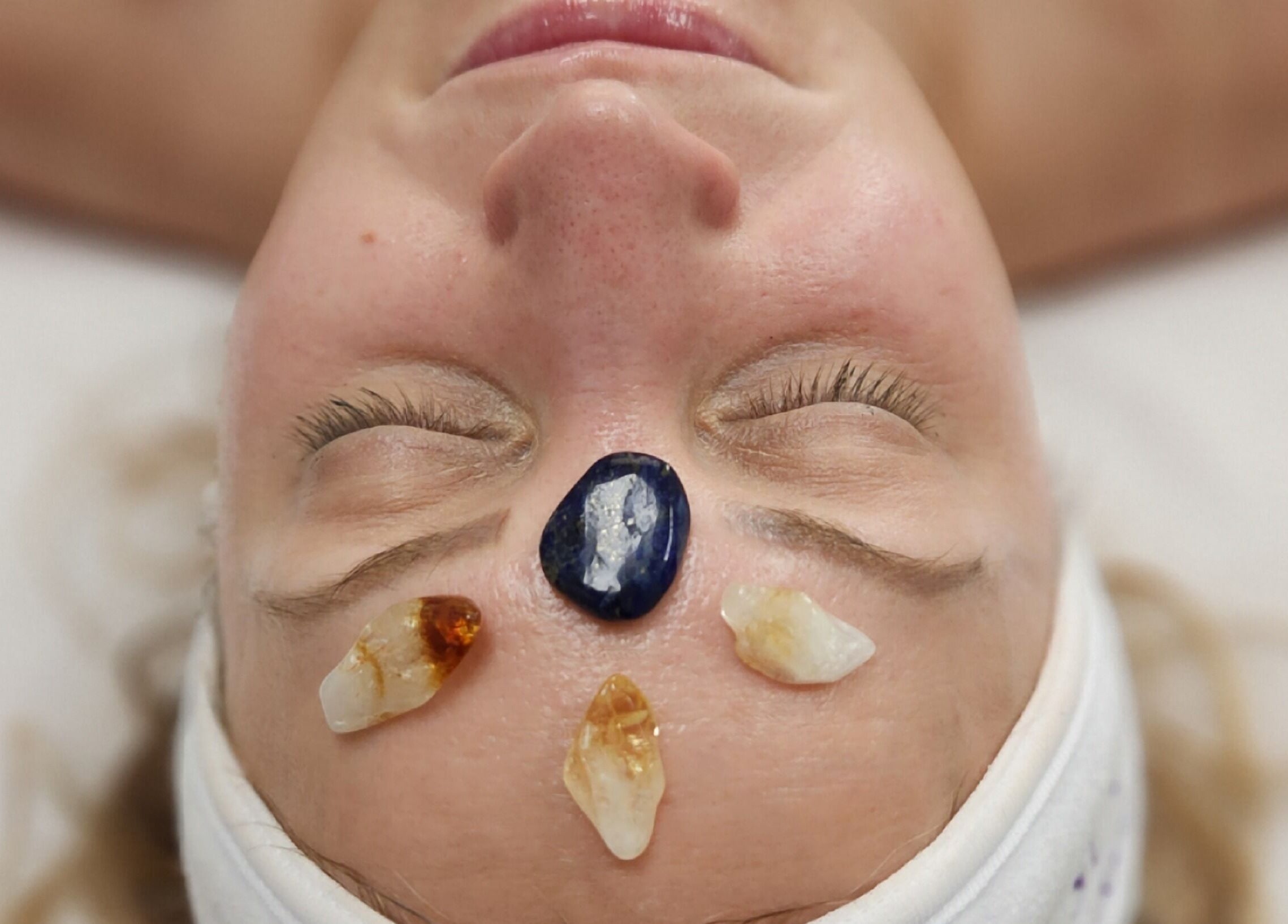Rejuvenating crystal facial at Enlightened Esthetics, Woodstock, Georgia, US, enhancing relaxation and energy balance.