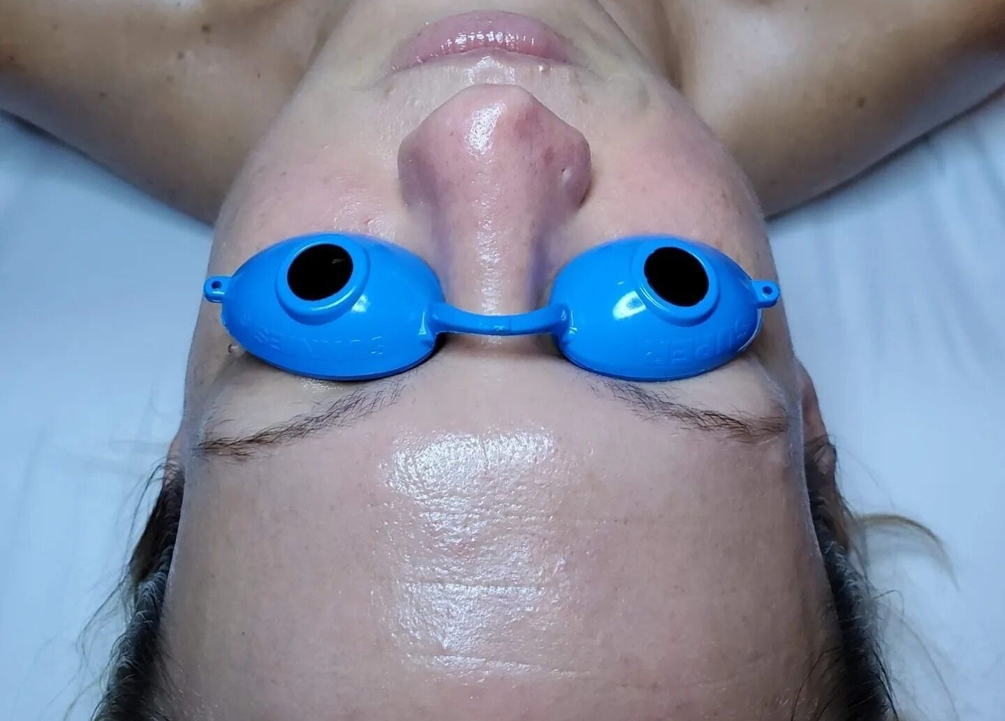 Facial treatment at Enlightened Esthetics in Woodstock, Georgia, US, showcasing rejuvenating skincare methods.