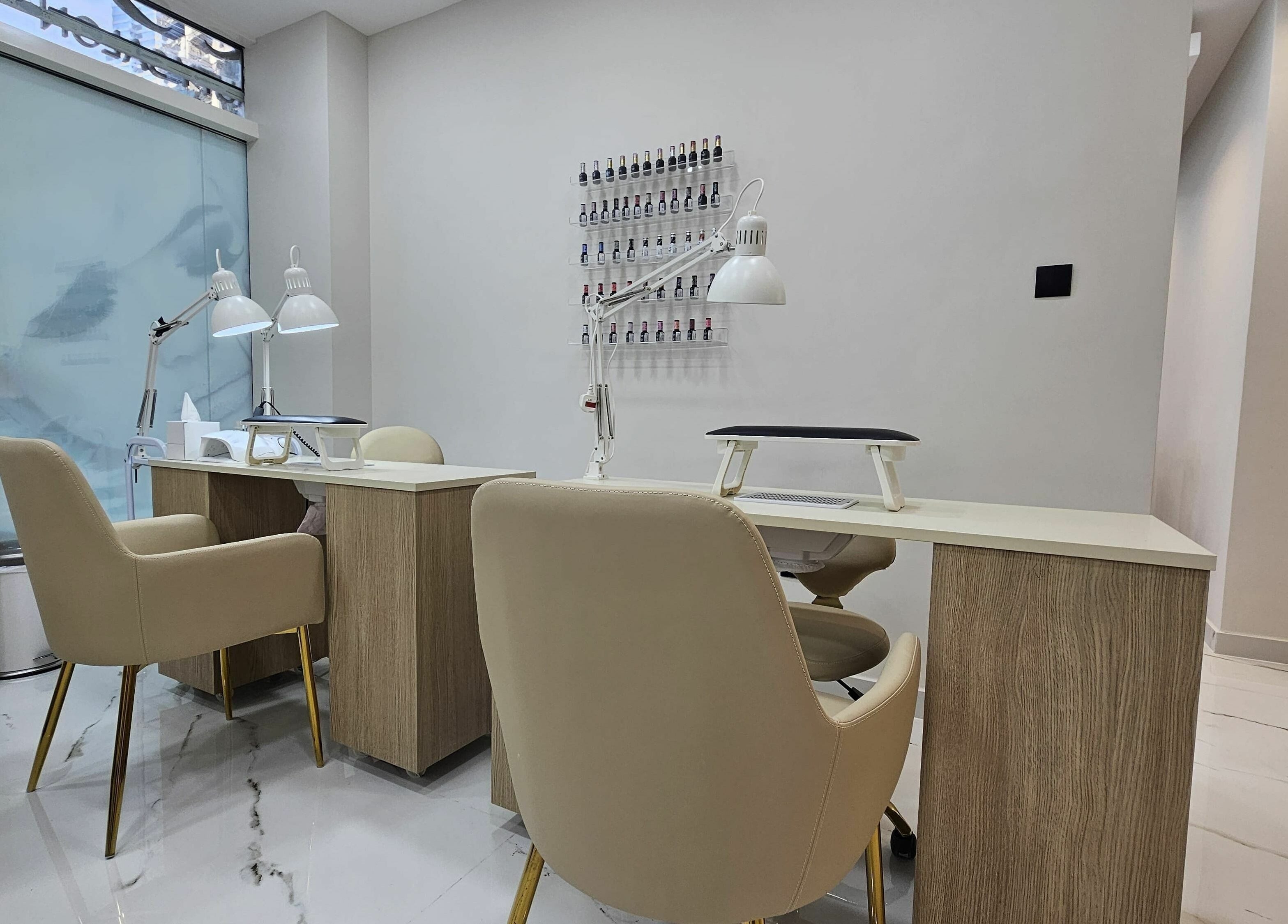 Chic manicure desk at Barbella by Blue Tree, Dubai, Dubai, AE highlighting modern nail care setup.