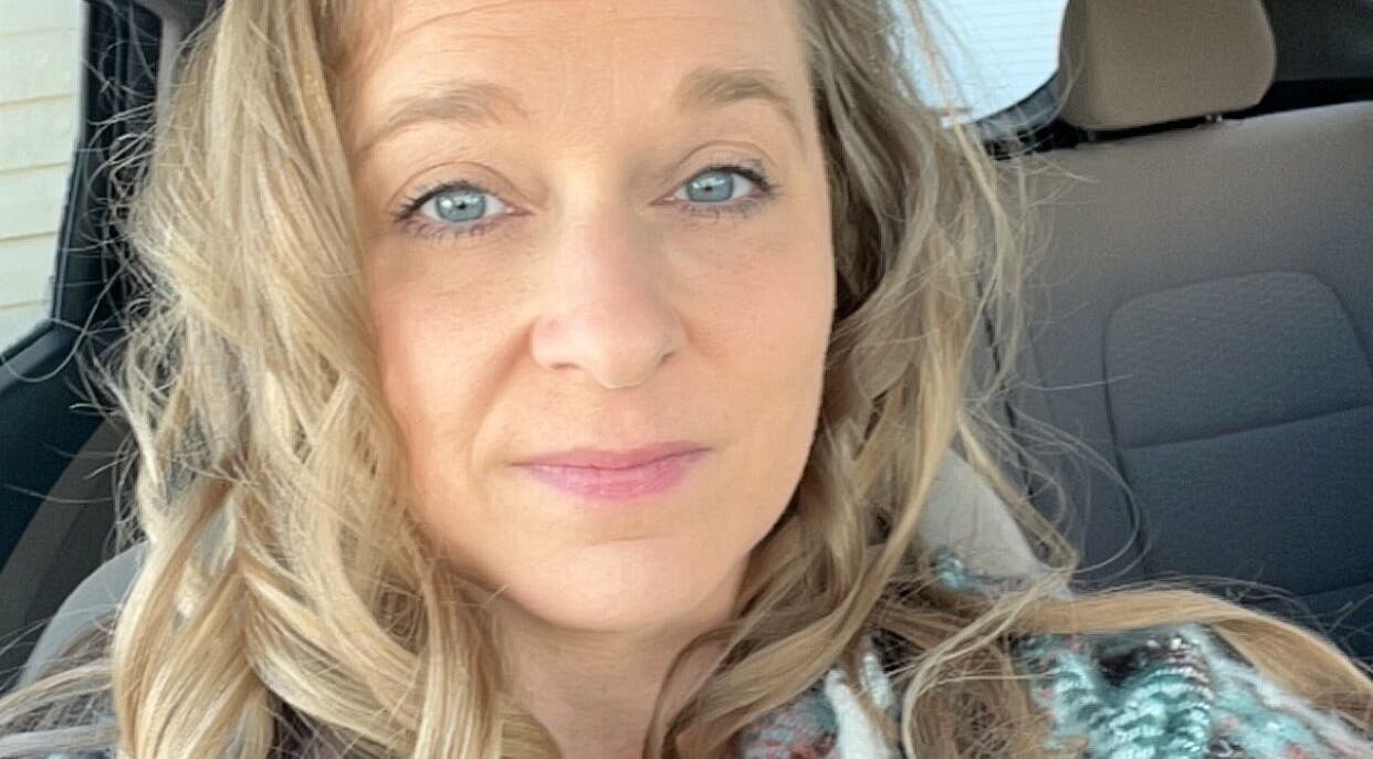 Woman with styled hair at Hair by Jessica, Boise, Idaho, US, showcasing professional salon results.