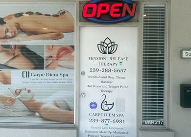 Entrance of Tension Release Therapy with spa ad at Fort Myers, Florida, US.