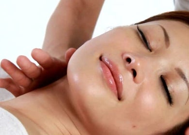 Woman enjoying a massage at Tension Release Therapy, Fort Myers, Florida, US.
