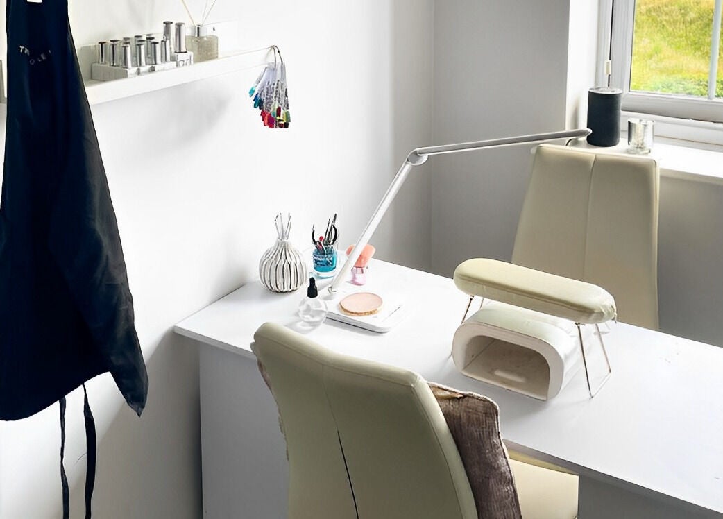 Cozy nail station at LoFlo Nails, Shrewsbury, England, GB, featuring a manicure table and tools.