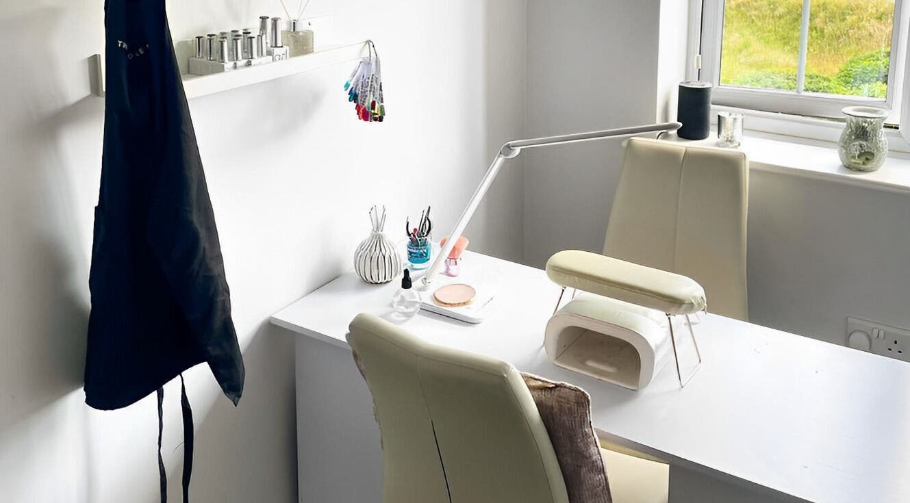 Cozy nail station at LoFlo Nails, Shrewsbury, England, GB, featuring a manicure table and tools.