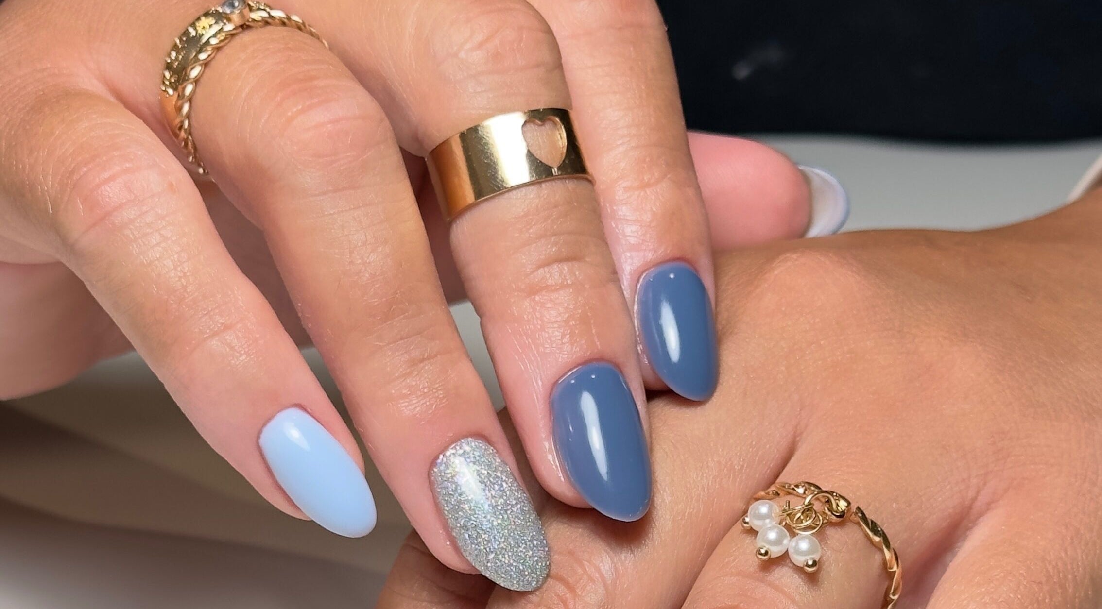 Elegant nail art at Cristal Beauty Point Cook, Melbourne, Victoria, AU, featuring blue and silver design.